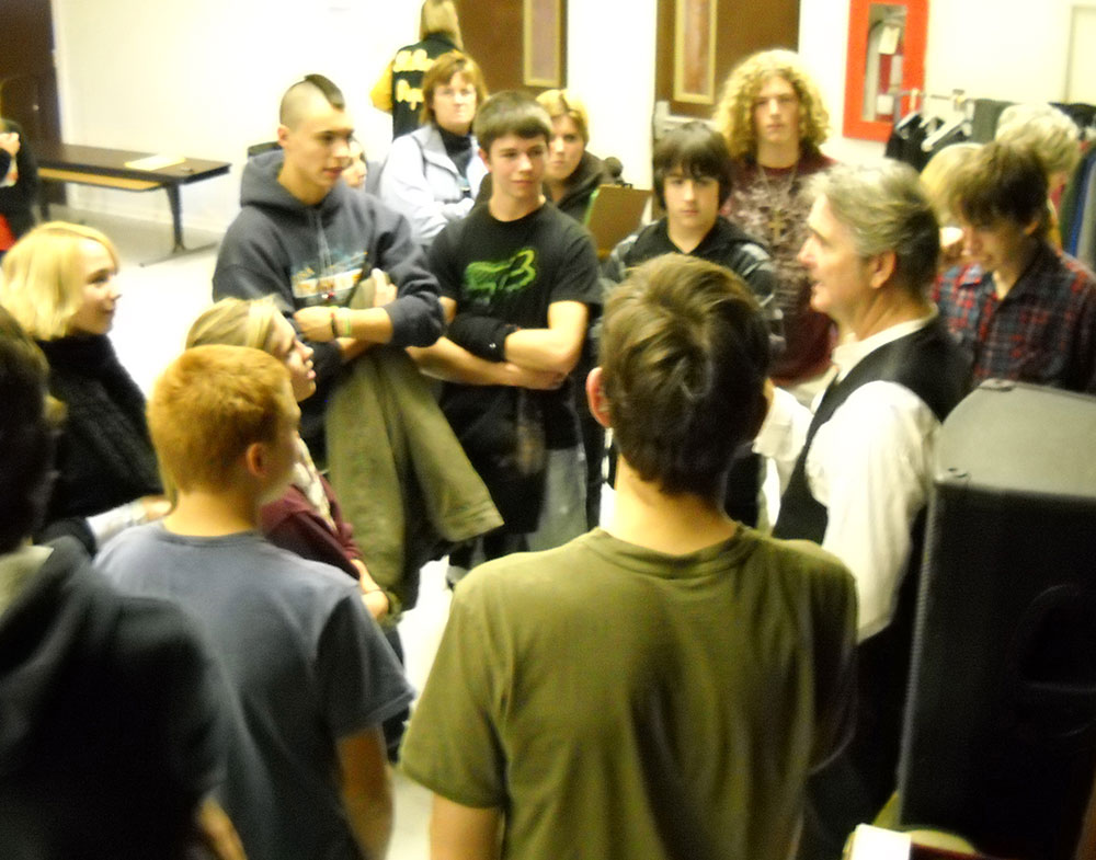 Spencer talks with Montana high school students after his performance.