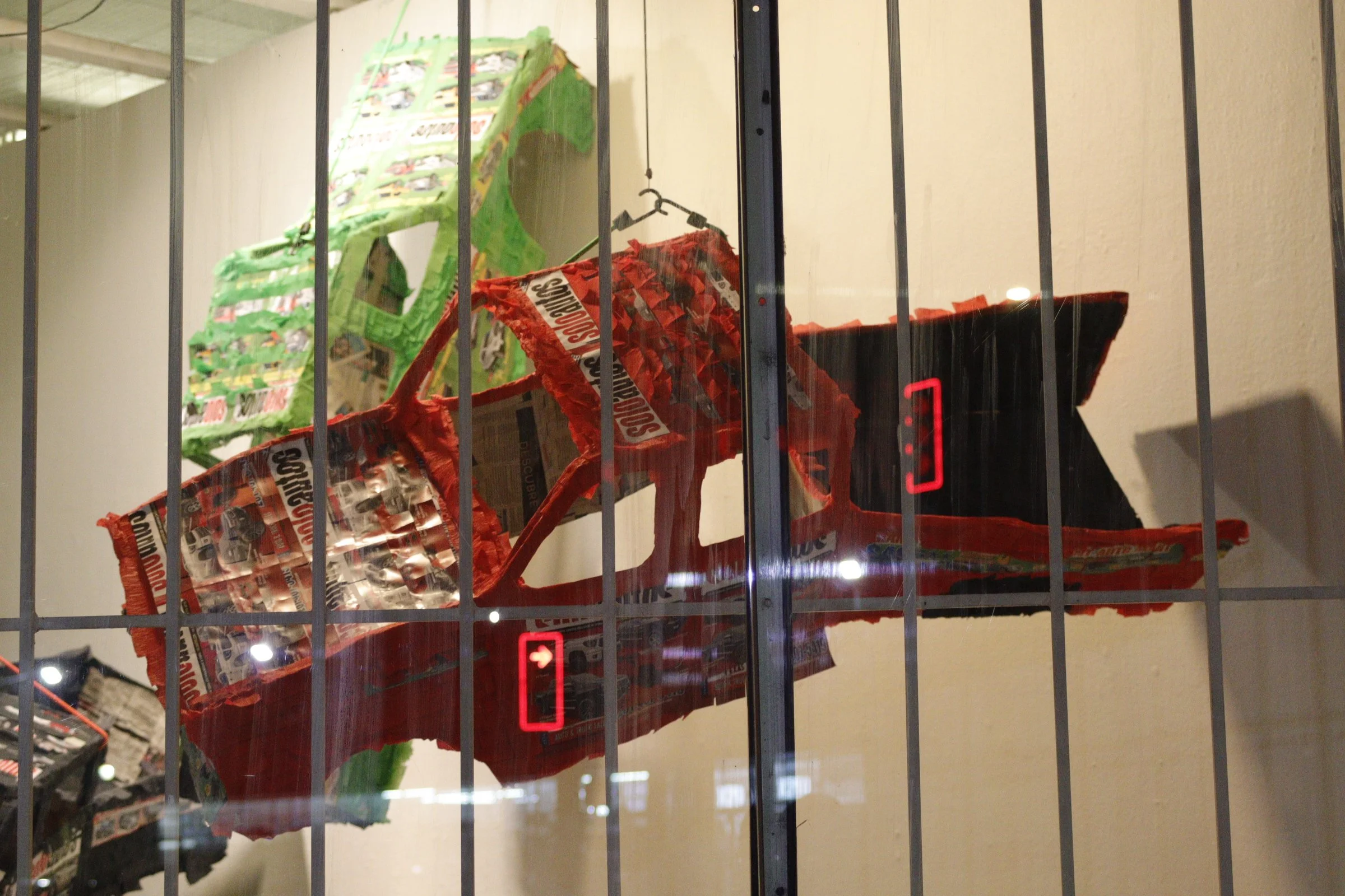   rastros  (2024) is a series of truck piñatas made from solo auto magazines found in Houston to explore themes of accumulation, car culture, and familial histories of labor through constructing piñatas.  In Miami, a rastro is a self-service junkyard