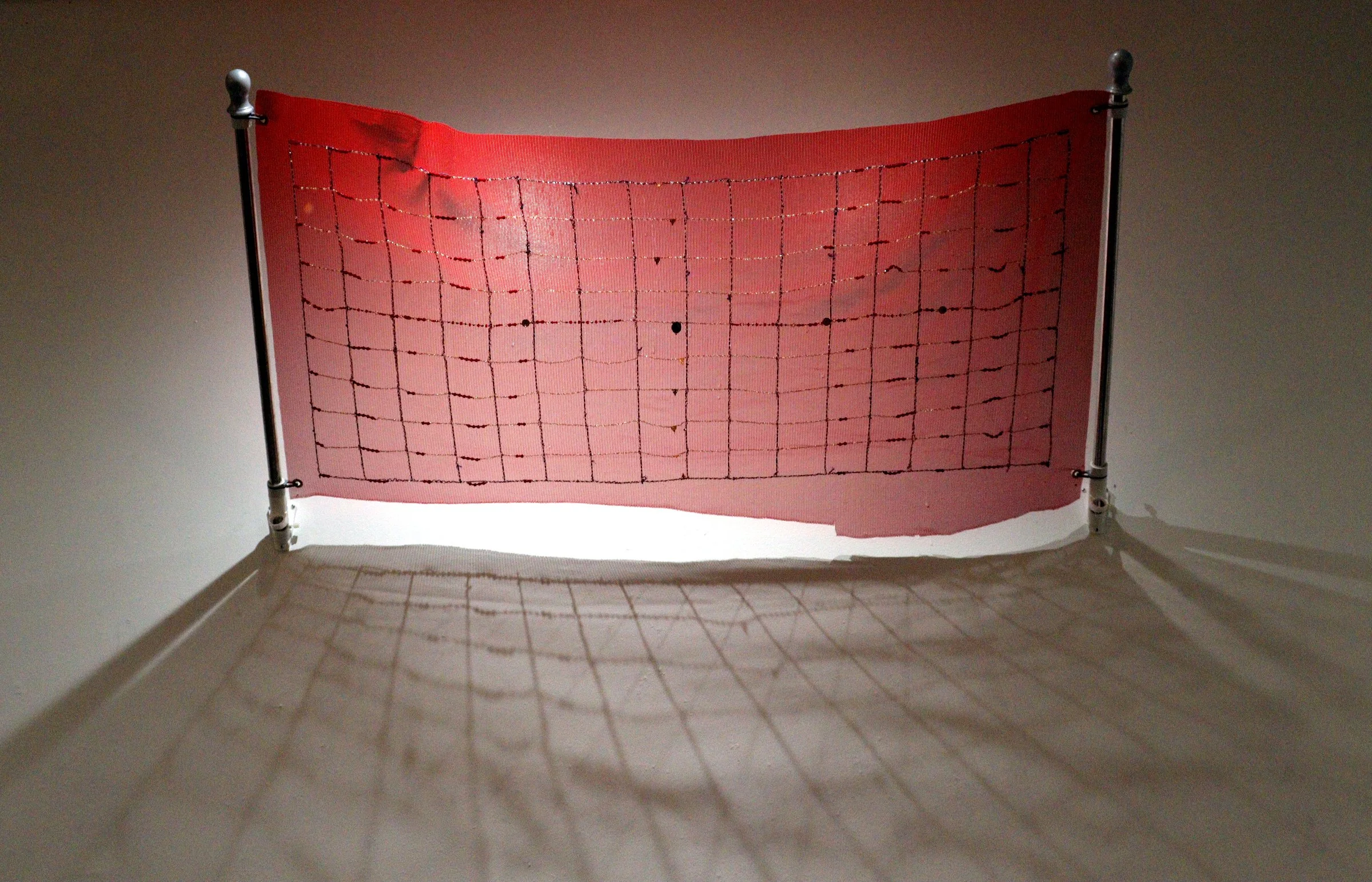  In red de seguridad (2024), Montoya made a safety net from rosary beads, embroidery floss, and debris netting inspired by nets designated to collect debris from buildings under construction. This piece is influenced by a family story about Montoya’s