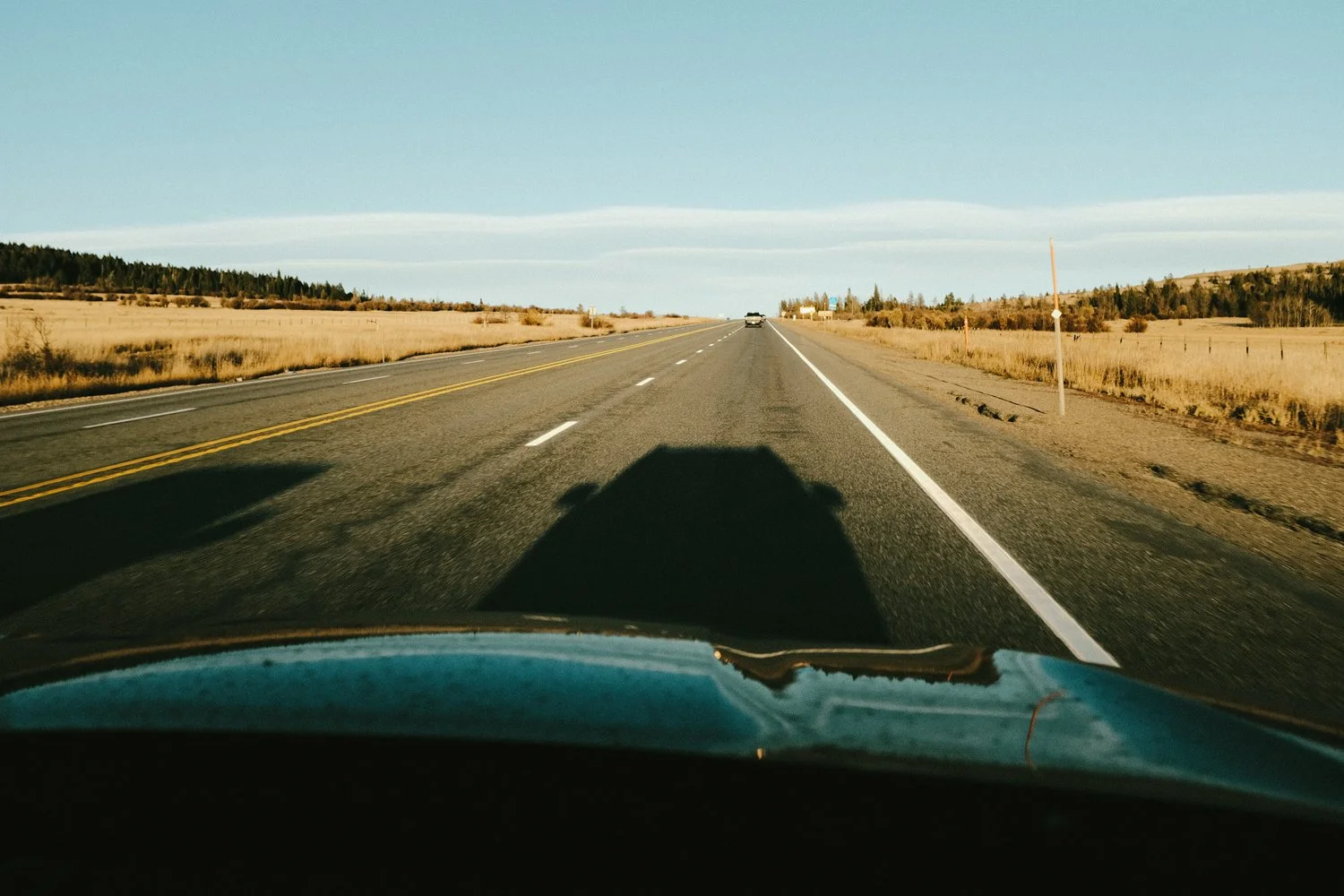 Empty road in Montana by Chasers of the Light 
