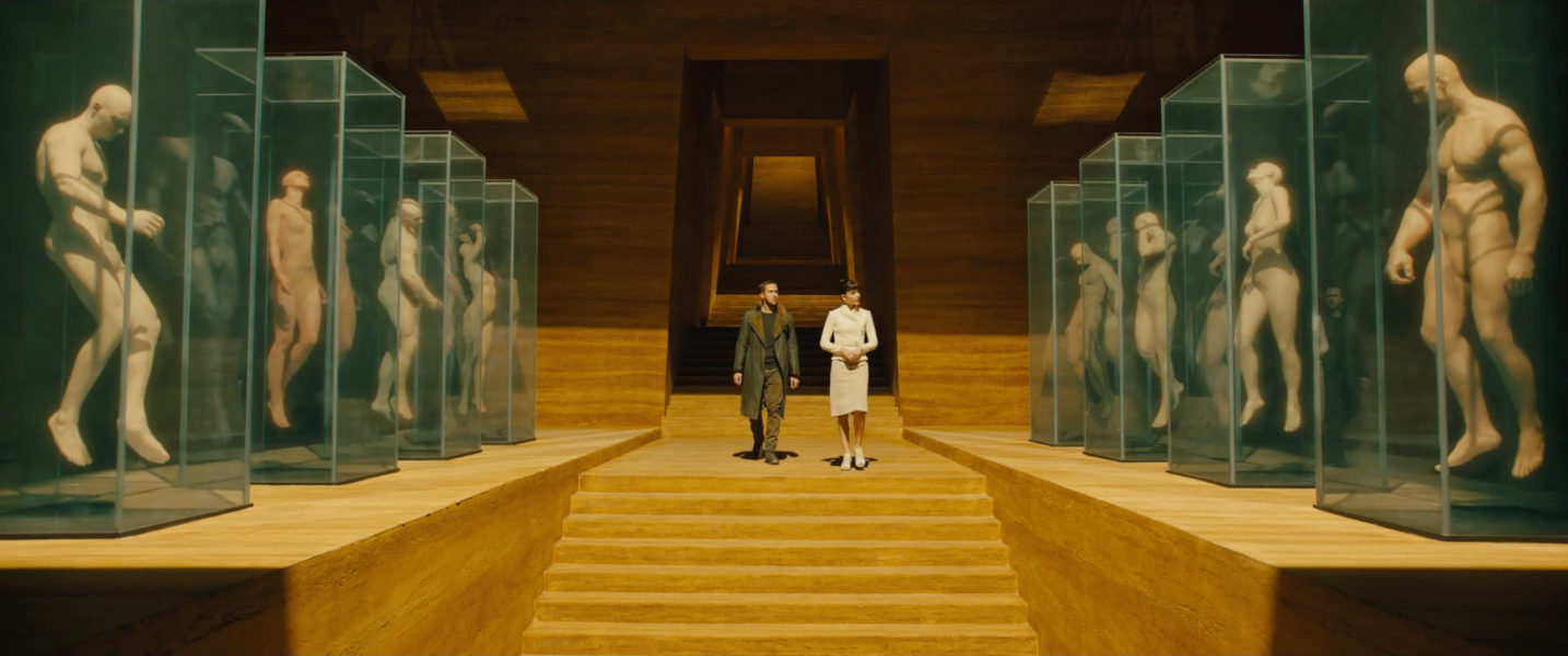 Main character 'K', (Ryan Gosling) is taken through the mass production center where replicants are made in "Blade Runner 2049" now in theaters.