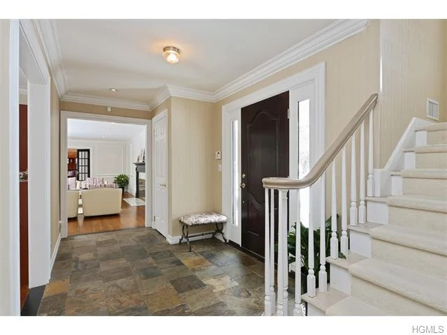 Before - a cramped uninviting entry hall