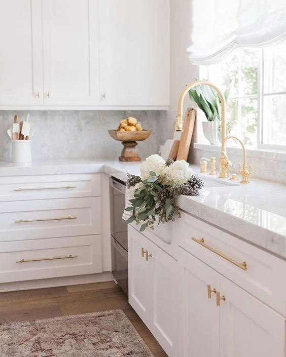Brass hardware and faucet add character and sophistication to the kitchen 