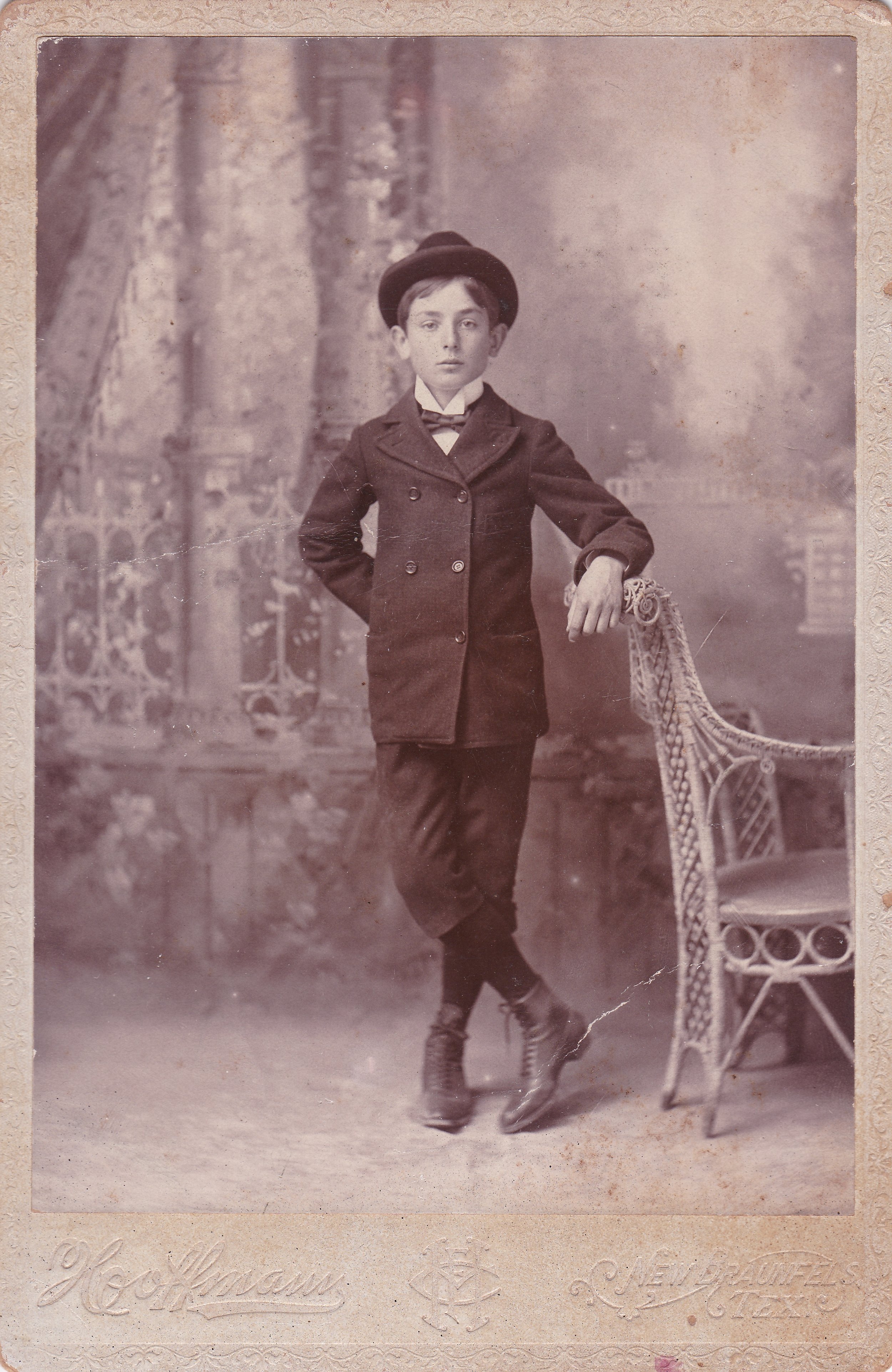 Vintage photo that I picked up at an antique fair of a boy wearing a hat.