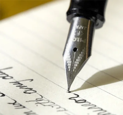Writing a letter with a fountain pen