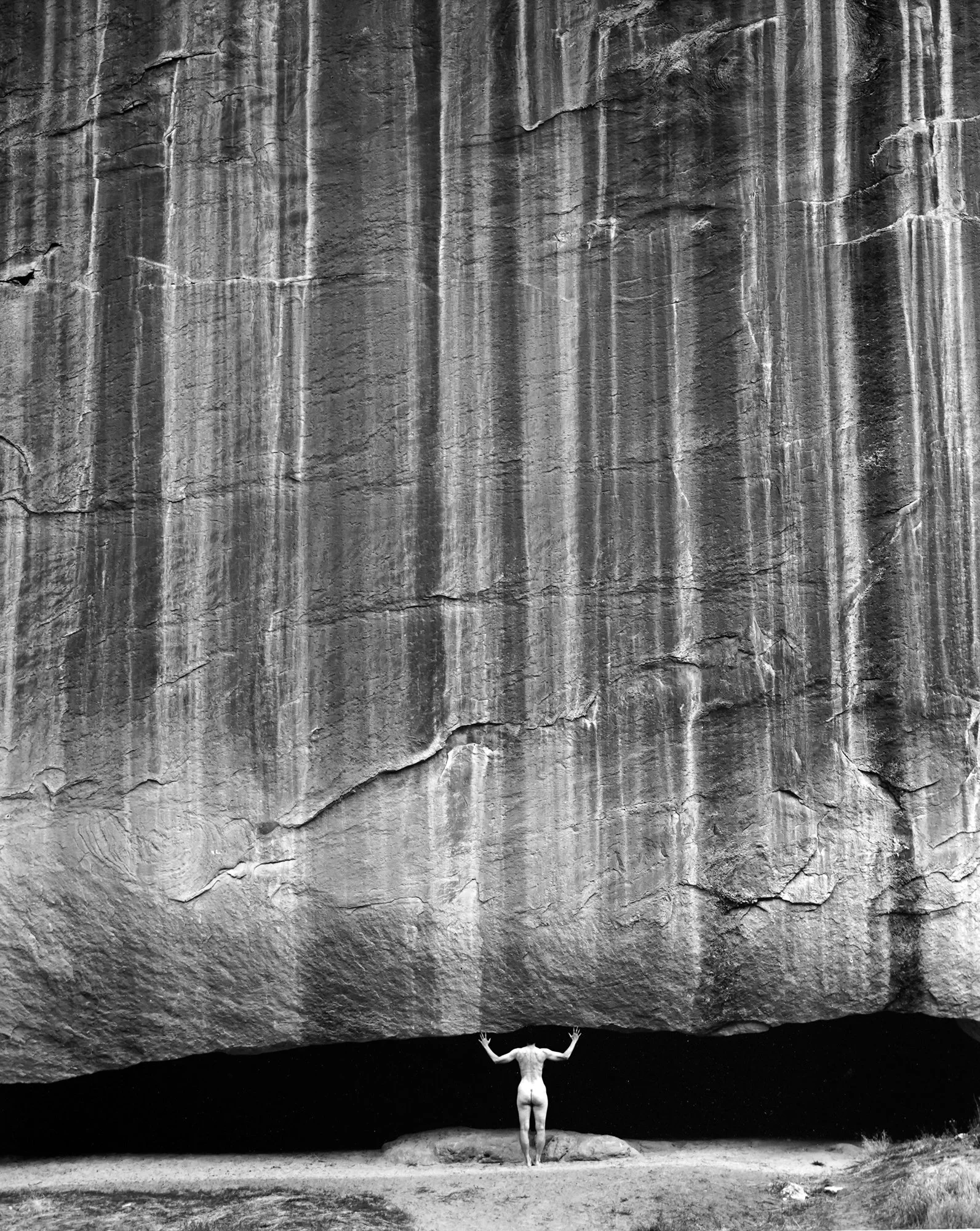 Sharon Lifting Rock Cliff.jpg