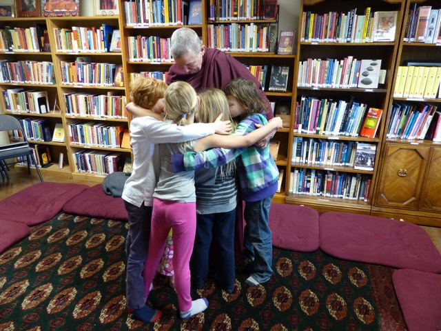 Lama Pema and Dharma Kids hug 2016.jpg