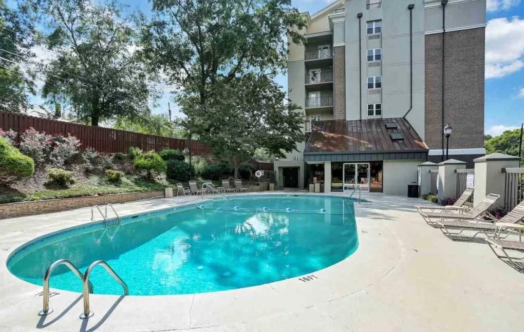 Large saltwater pool with gentle steps leading into the shallow end. Maximum pool depth reaches 10 feet in the deep end.