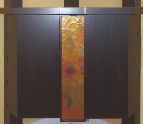 embossed copper panel with patina