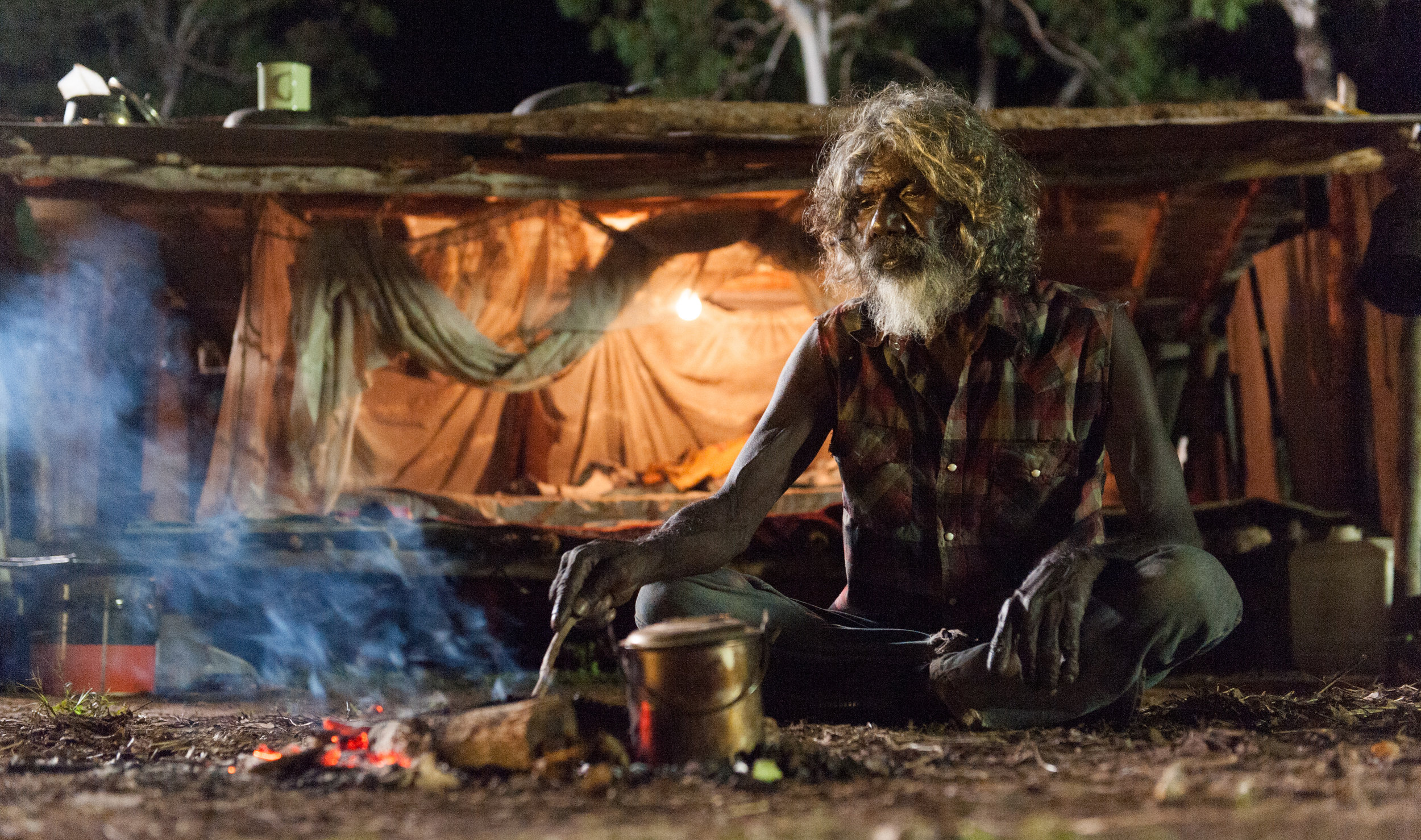 25_CCA2156 - Charlie (David Gulpilil) in front of his humpy copy.jpg