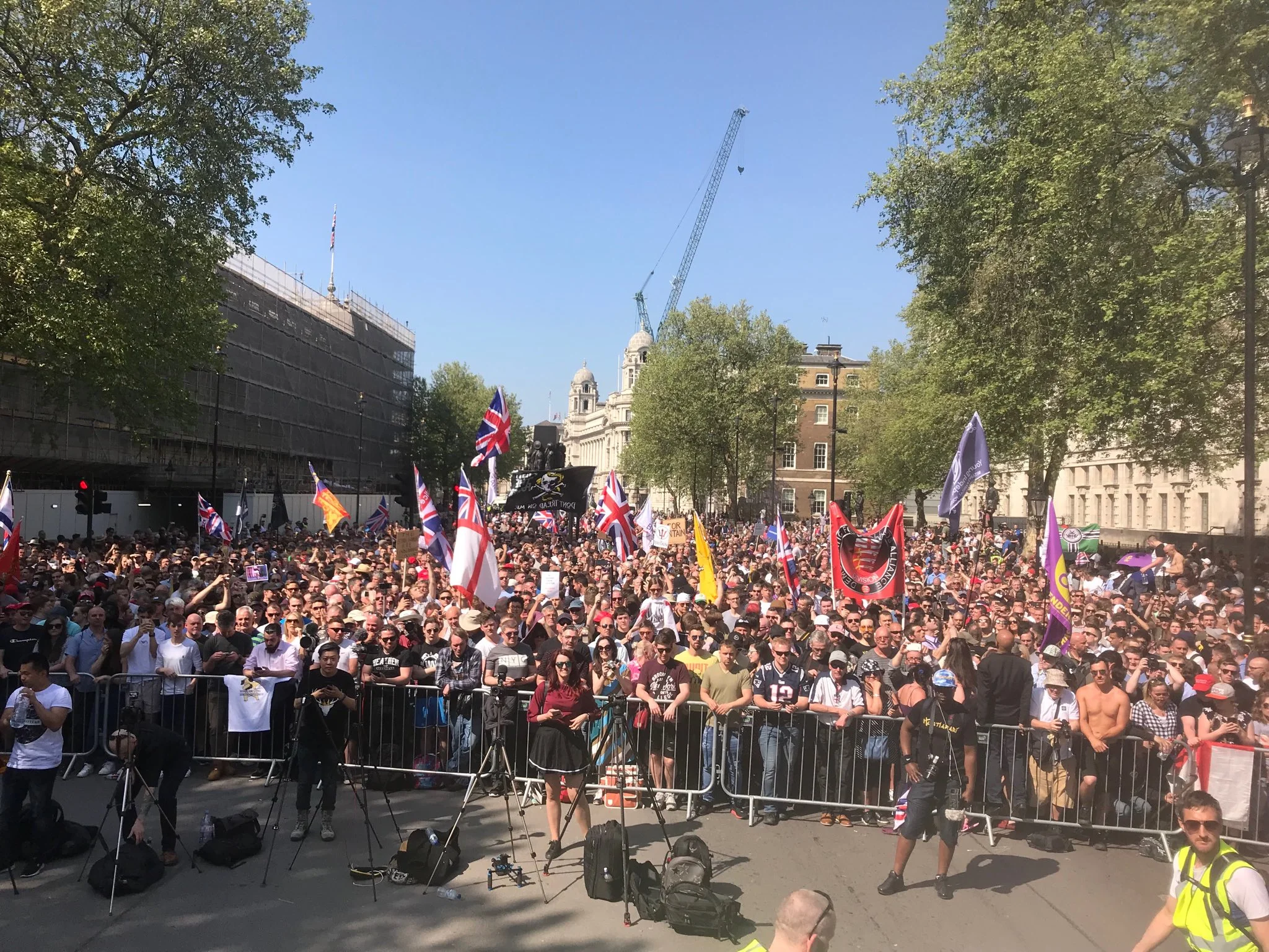 A massive crowd gathers to hear Tommy Robinson speak at "A Day For Freedom" Event in Whitehall London.
