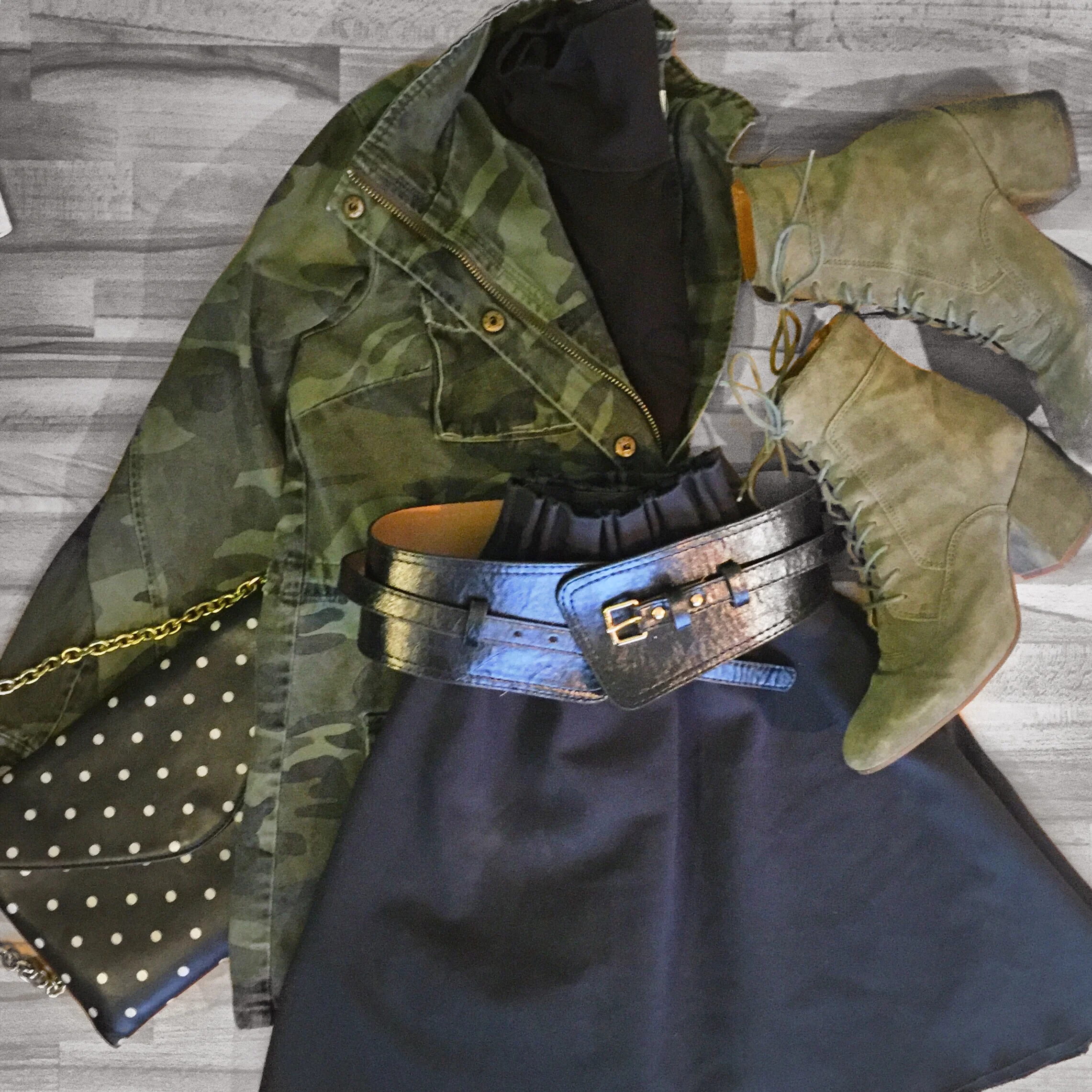 Camo jacket ( Stitch Fix ), Black turtleneck ( Uniqlo ), Corset belt ( Asos ), Green skirt (Zara - similar here and here ), Green lace-up boots ( Franco Sarto ), Polka-dot purse (J. Crew - similar here )
