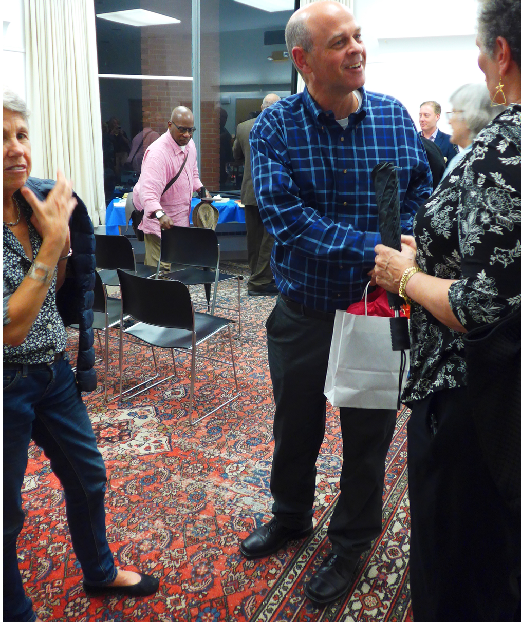 Conductor Gil Rose greeting opera enthusiasts at the South End library in October