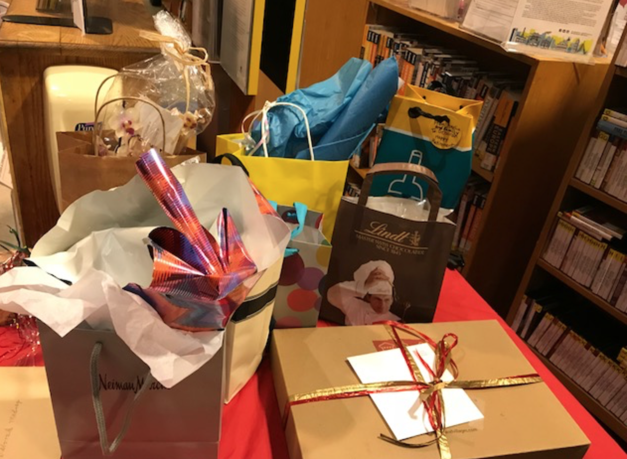 One of several tables laden with farewell gifts for Deborah Madrey