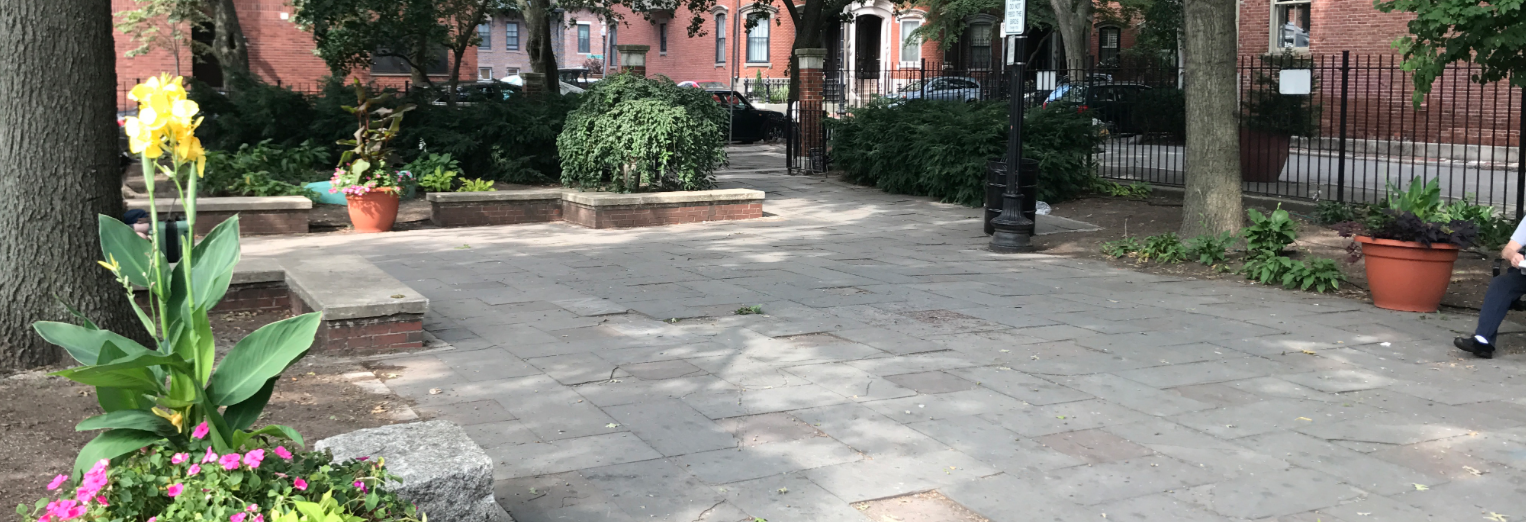 Library Park in its previous state, with a large area of broken pavement and limited usage options. The new design, featured above, will have multiple seating arrangements. The construction, which began late July, may take three months.
