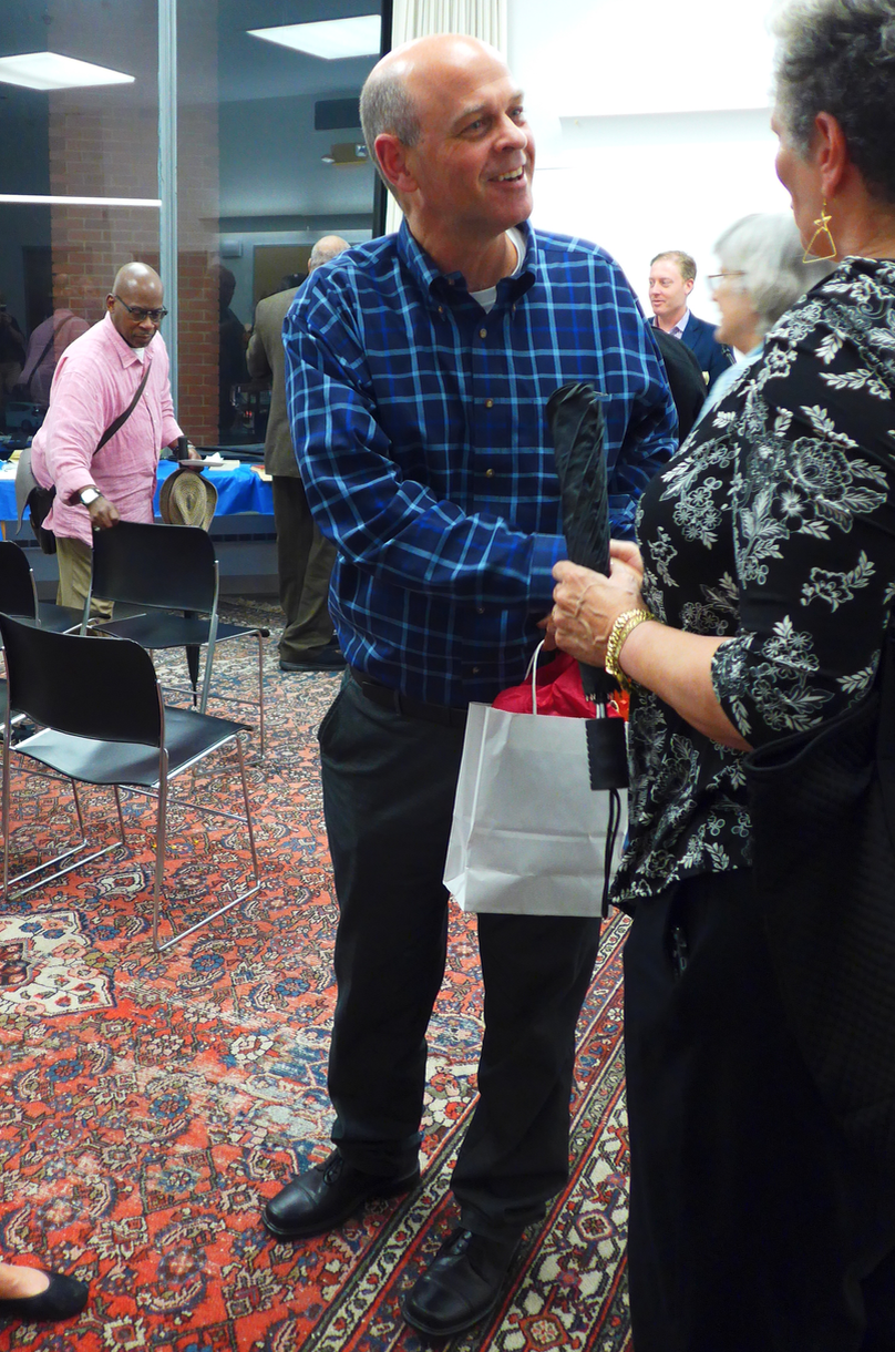 Artistic director/conductor Gil Rose greeting admirers at last year’s Odyssey Opera event at the South End library