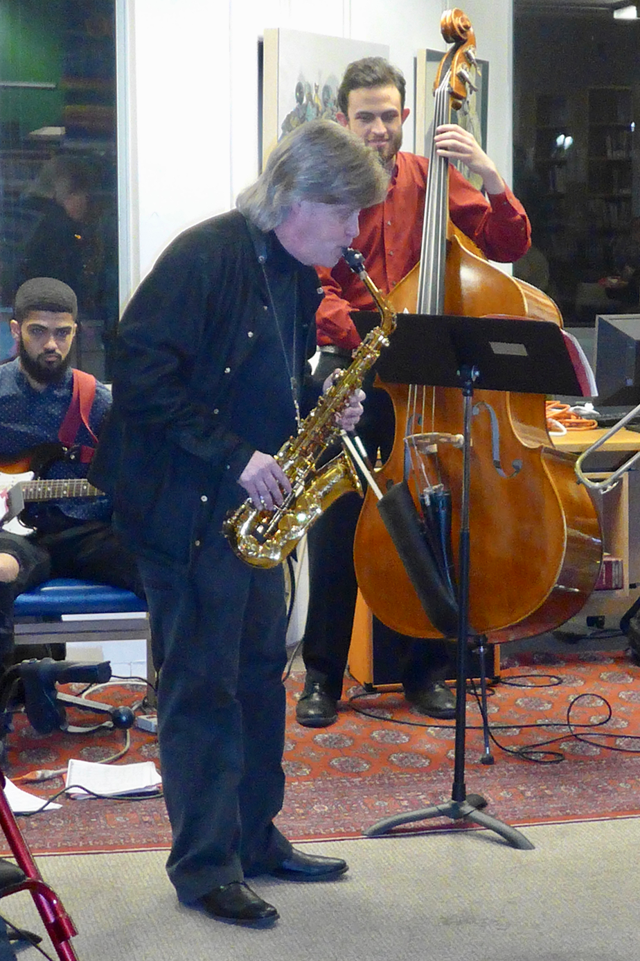 Antonio Loomis, Pat Loomis and Colescott Rubin weaving great music into the holiday party’s cheer