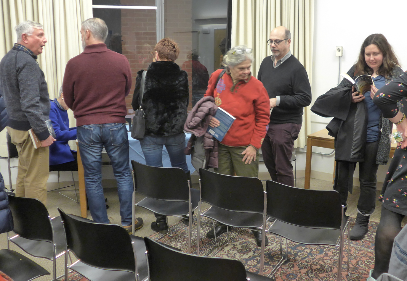 Southenders standing in line to buy a copy of Joan Diver’s book and having her sign it…