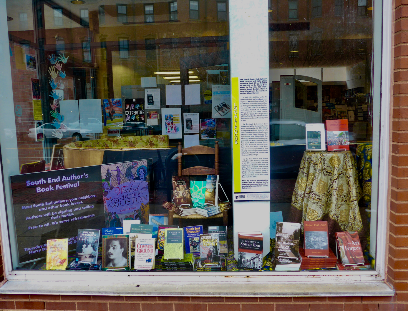 A selection of the many titles by South End authors participating in the Fourth Annual South End Authors’ Book Festival in Tent City on display in the South End library window