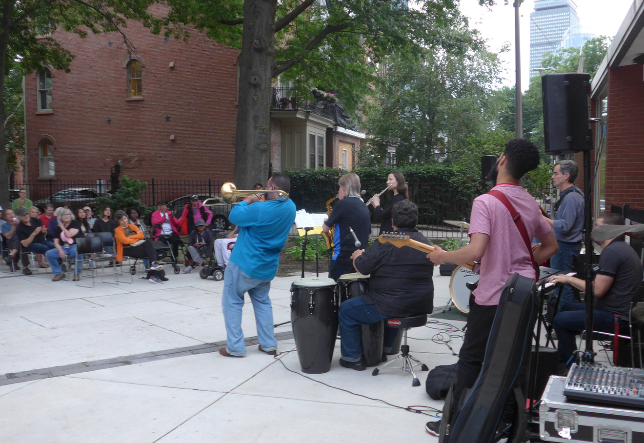 A happy crowd of Southenders under distant the gaze of the Prudential Tower