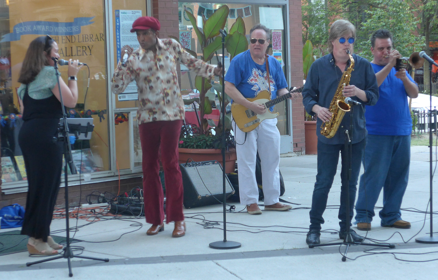 Vocalists Sarah Seminski and Nephtaliem McCrary sing with Daniel Day (guitar), Pat Loomis (saxophone) and Scott Aruda (trumpet).