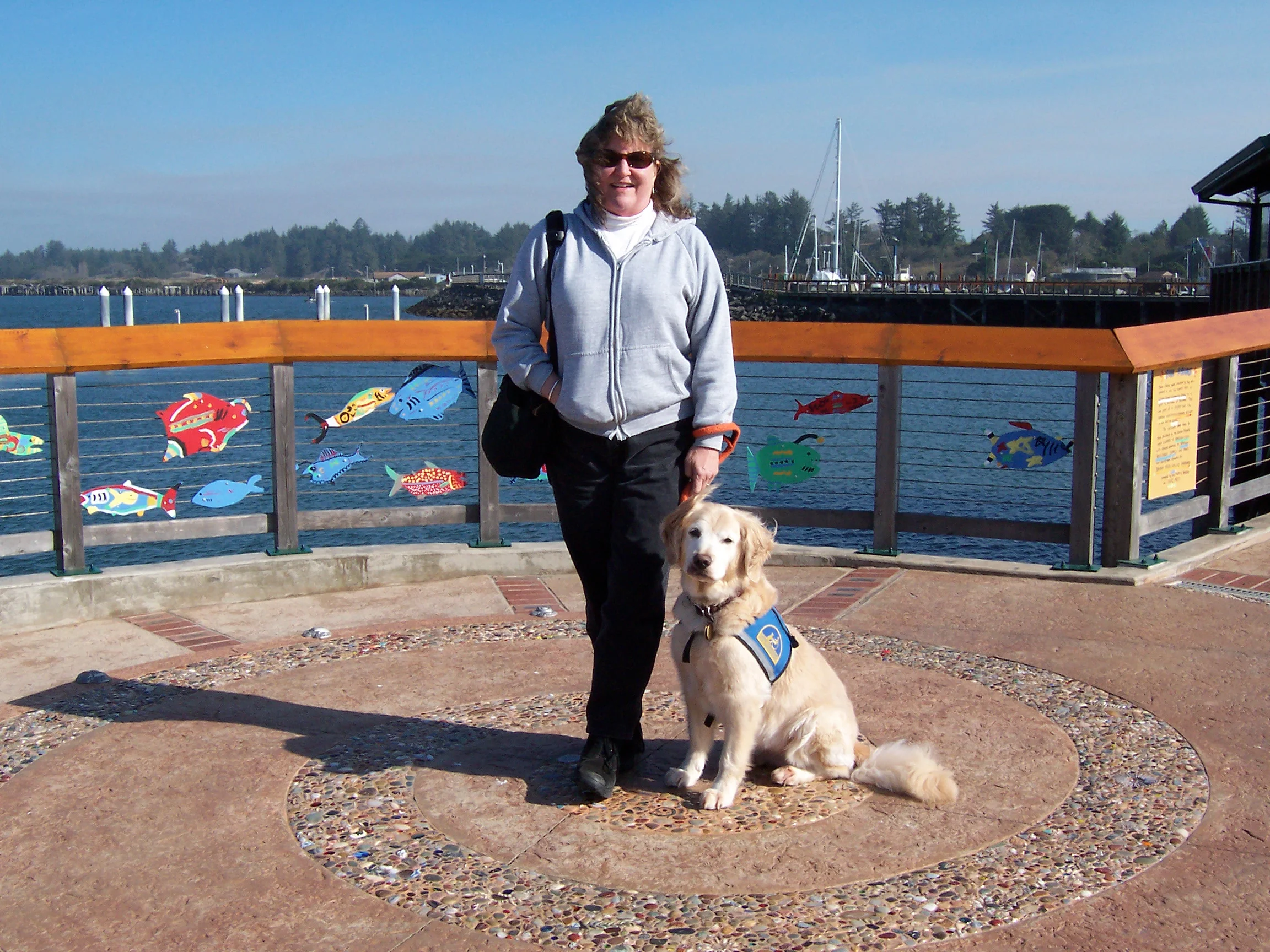 Barbara and her current hearing dog (HD), Fallon.