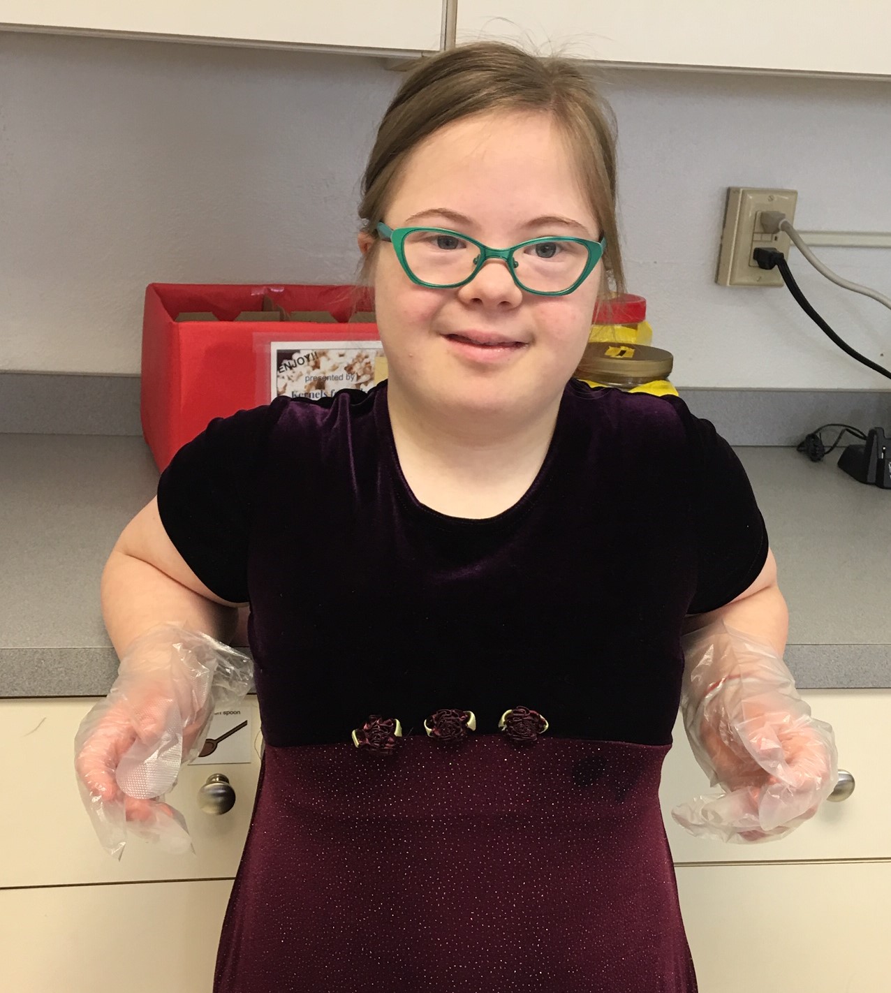 Central Middle School Student with gloves on waiting to bag popcorn 4.9.19. Clearance on record. - Copy.jpg