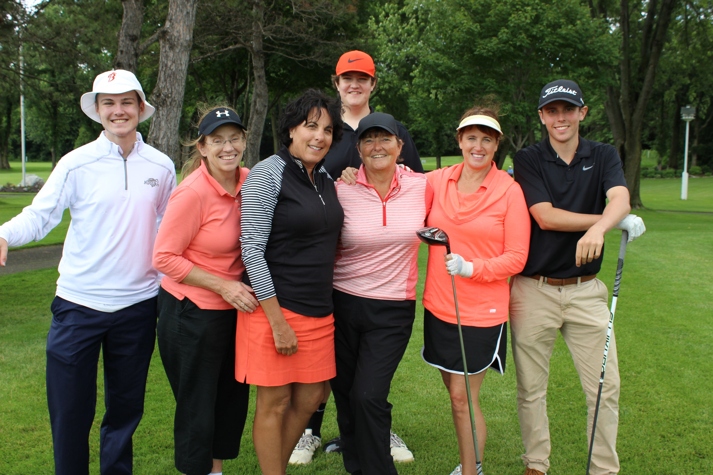 14A Mary Cox, Cathy Poechmann, Sue Ryan, Beth Pilacinski w boys golf players.JPG