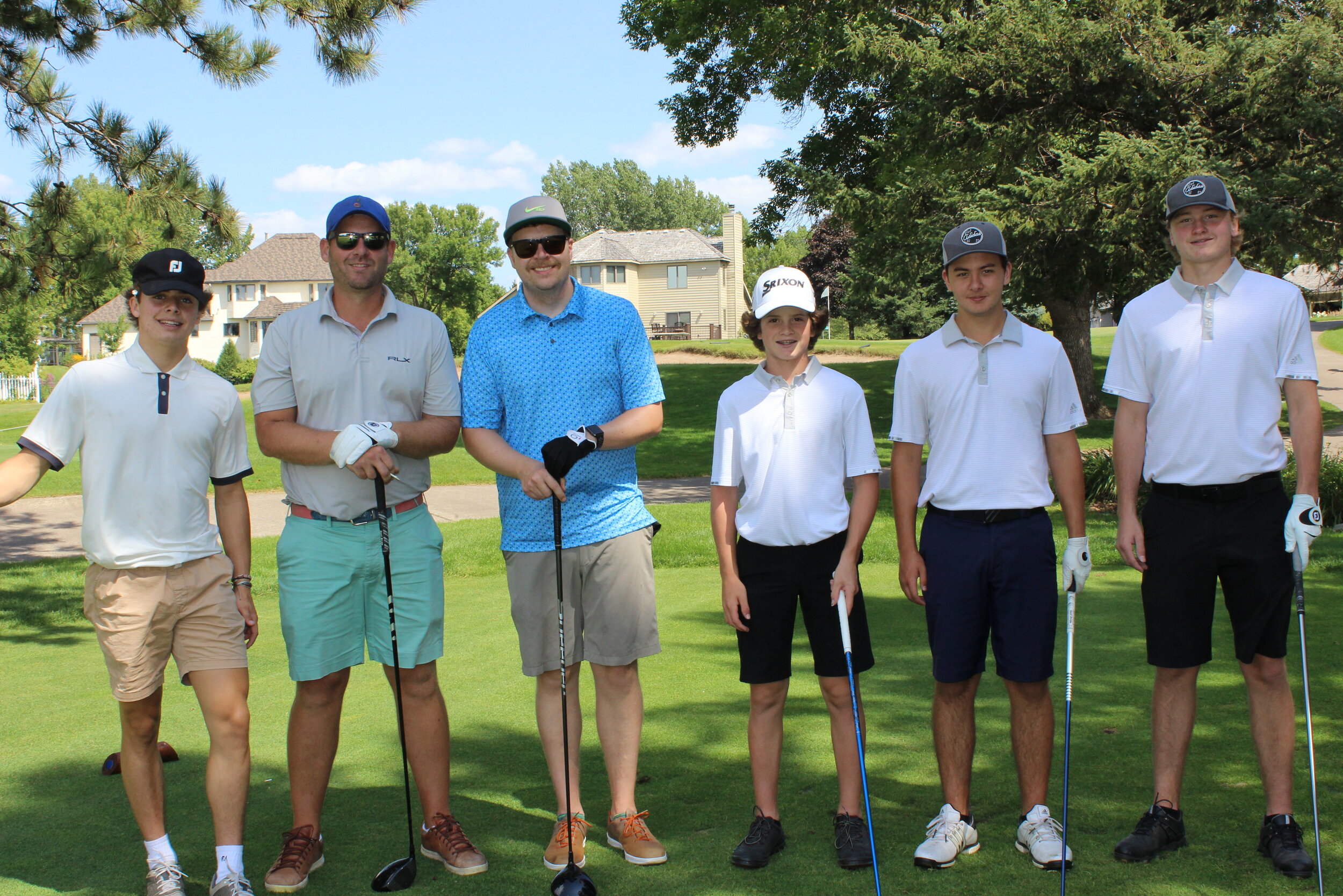18A One Digital Chad Hime, Ben Stevenson with high school golfers.JPG