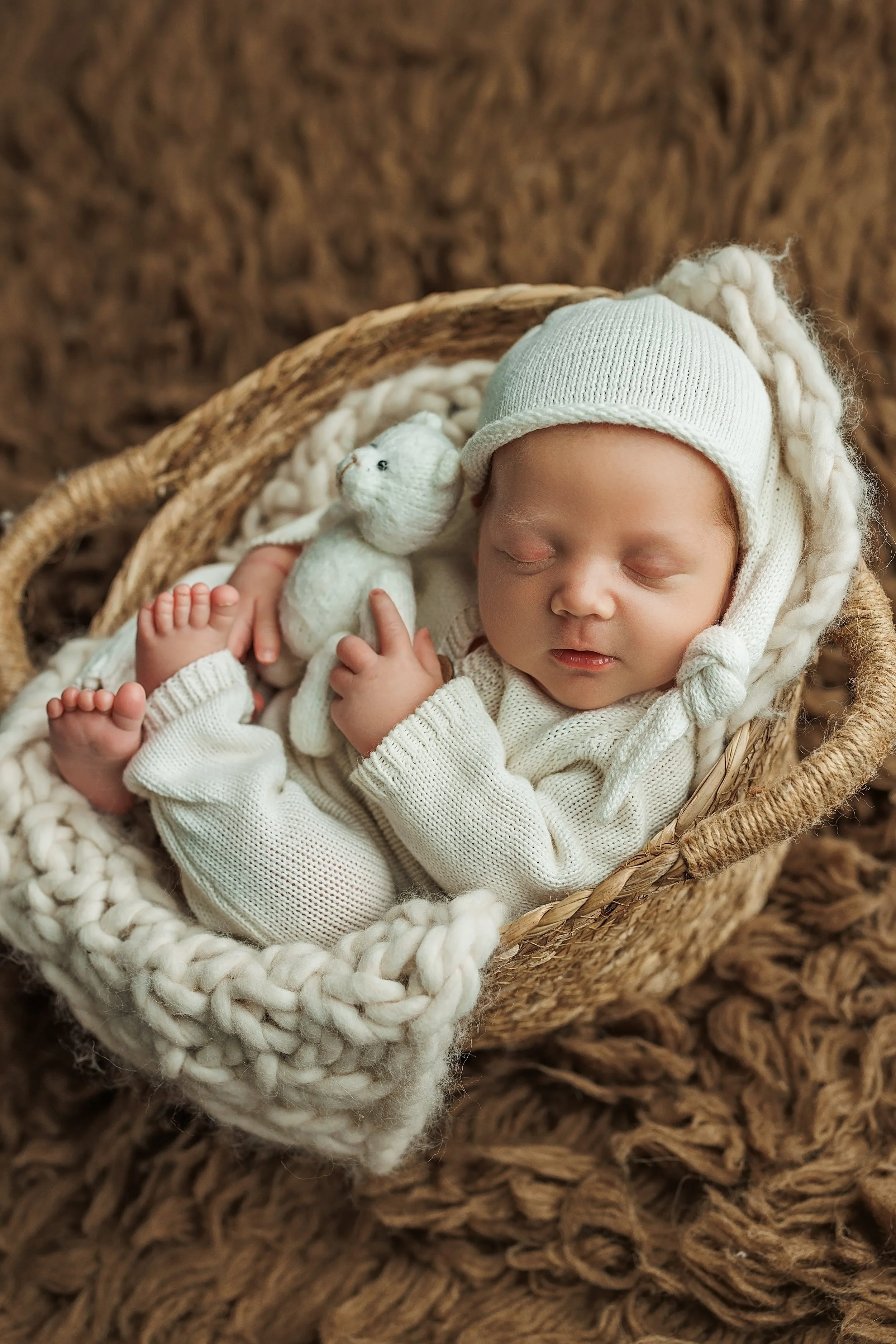 Newborn photographed in neutrals 