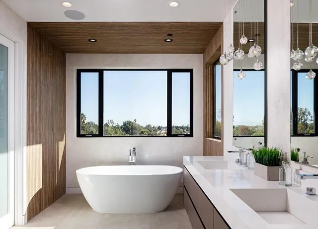 Love the wood in this master bath.