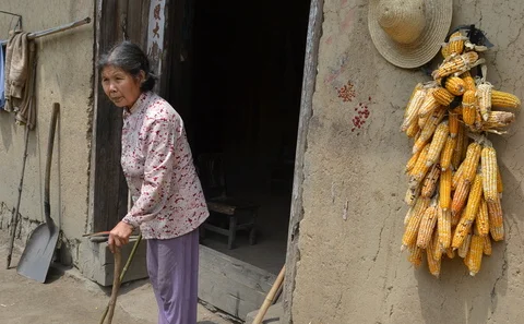 Residents struggle in China's "model community" as millions set to be resettled