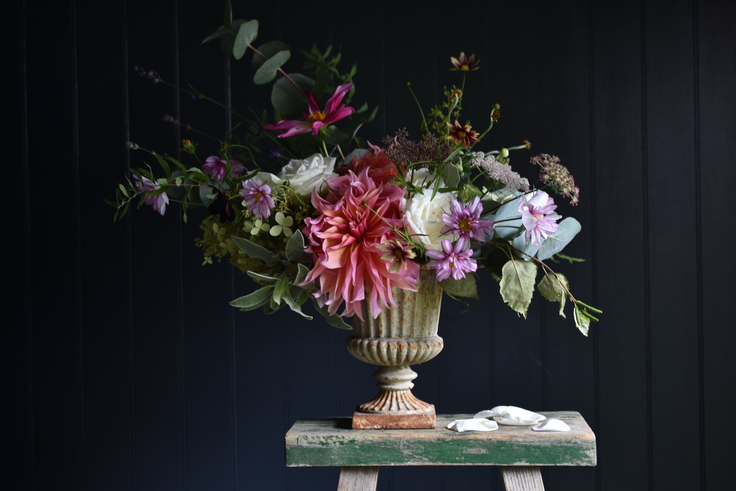 an urn of dahlias