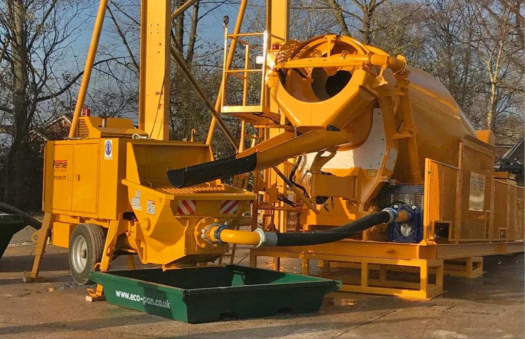 ECO-PAN washout tray under a pump