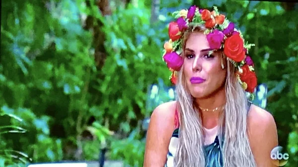 WHAT IN THE HELL DOES THIS BITCH HAVE ON HER HEAD. It's like out of a colorful children's book. Amelia Bedelia Ruins a Wedding.