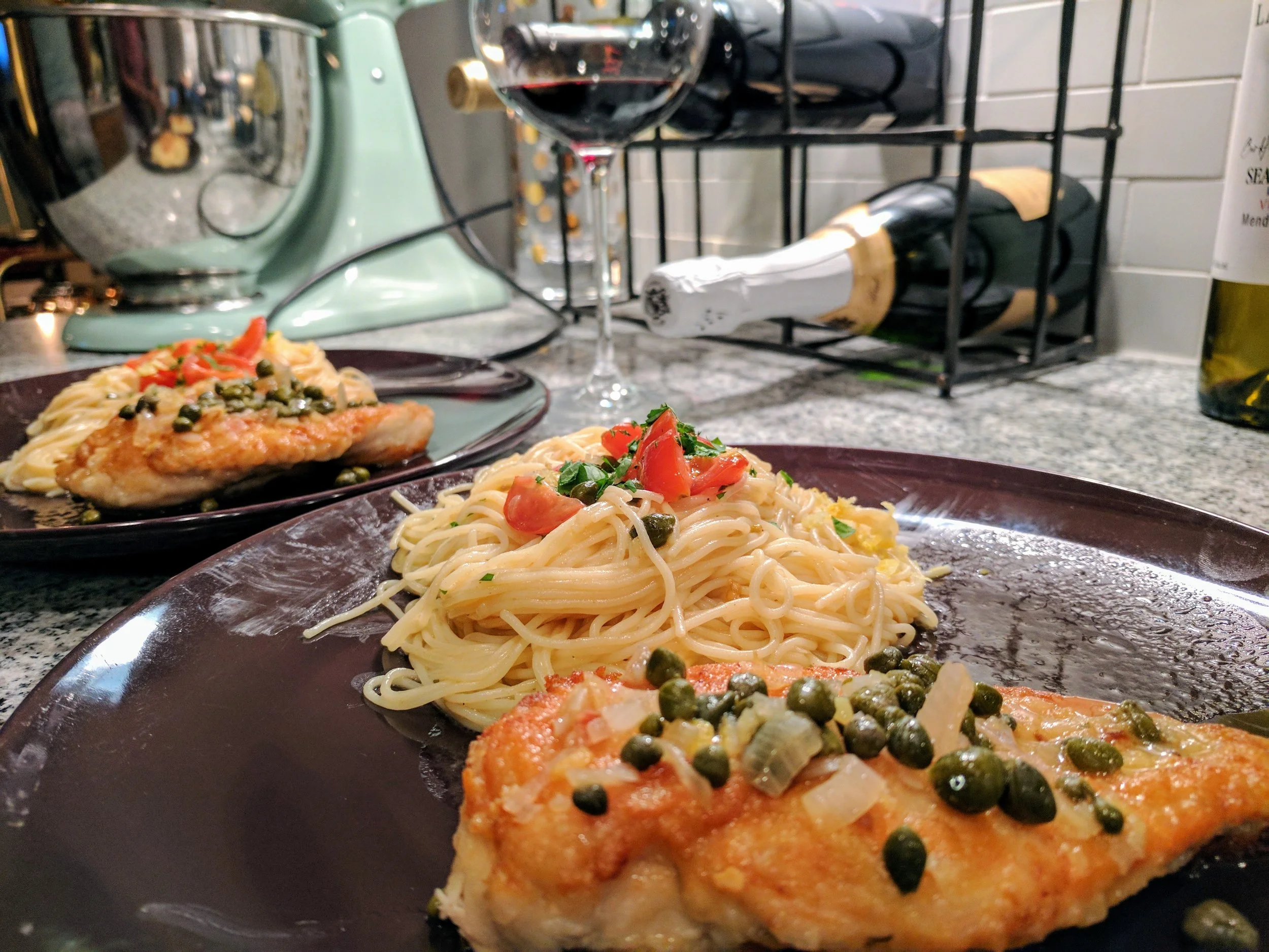 Classic Chicken Piccata with angel hair pasta and lemon-caper sauce