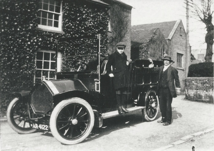  Frank John Bly standing on the side of the new company Humber Van, c 1911.&nbsp; 