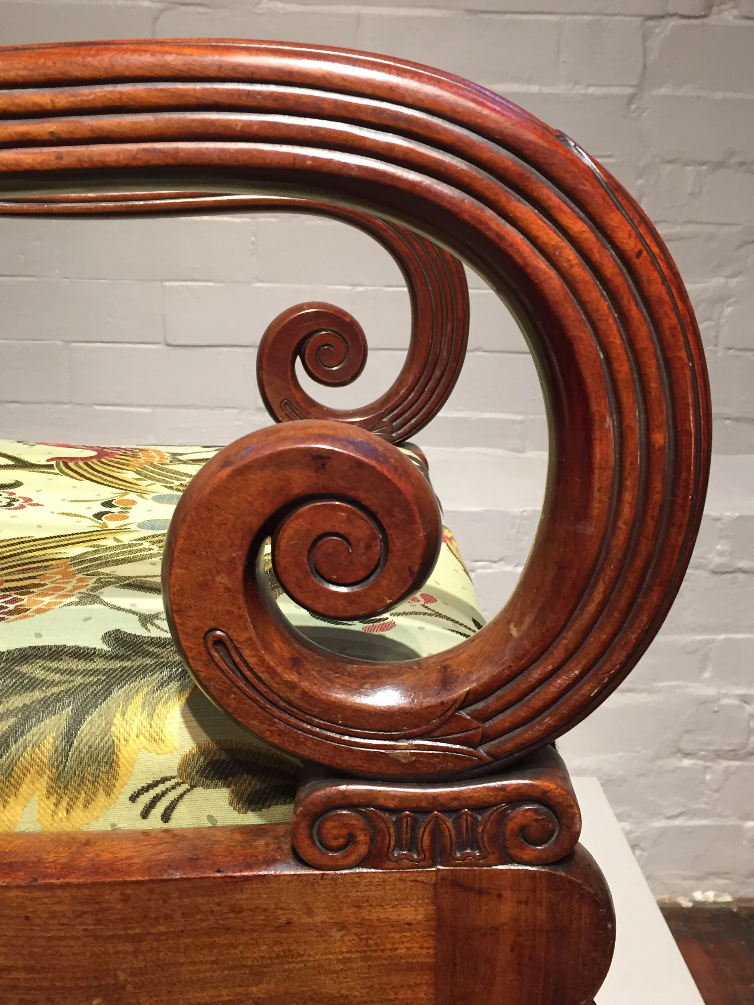 A fine French Empire period mahogany open arm chair. 