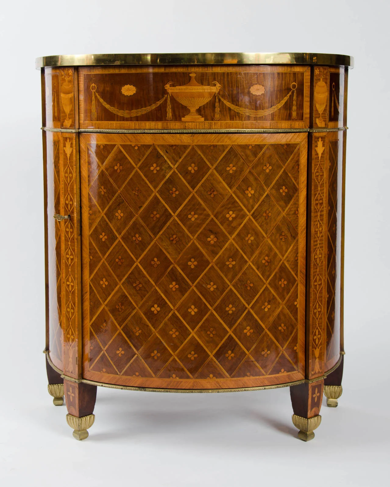 George III period demi-lune commode in the manner of John Linnell