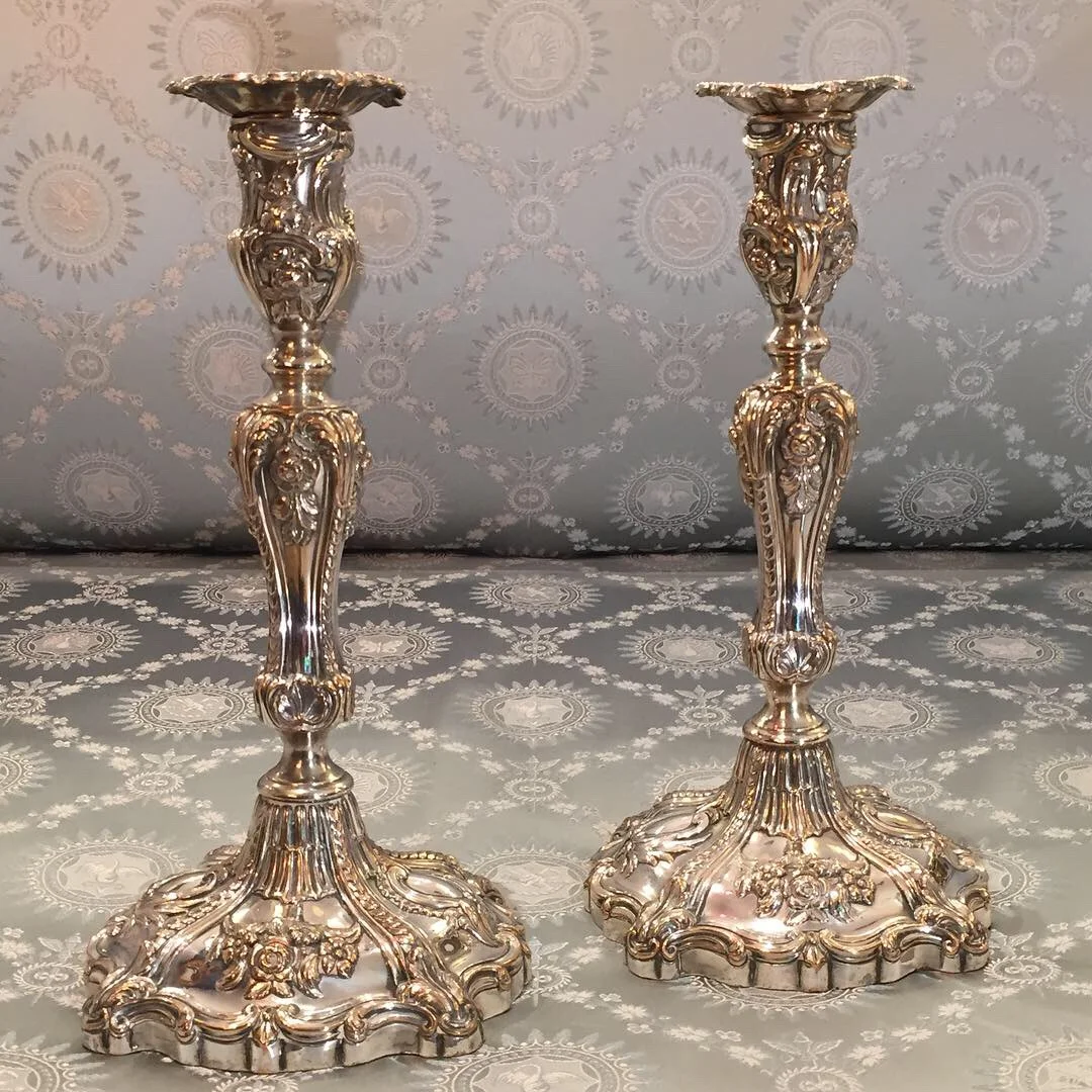 Regency period pair of Rococo Revival Sheffield Plate Candlesticks