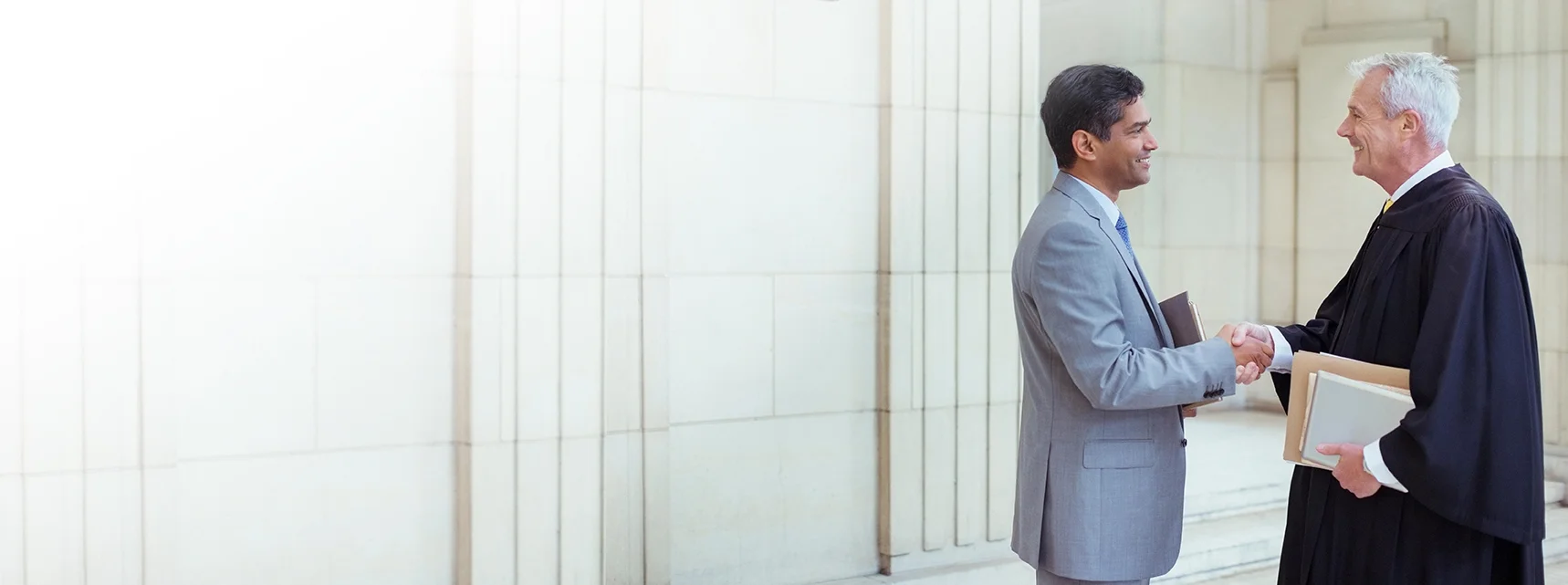 E76BJ42_Barrister Shaking Hands_Ret2.jpg