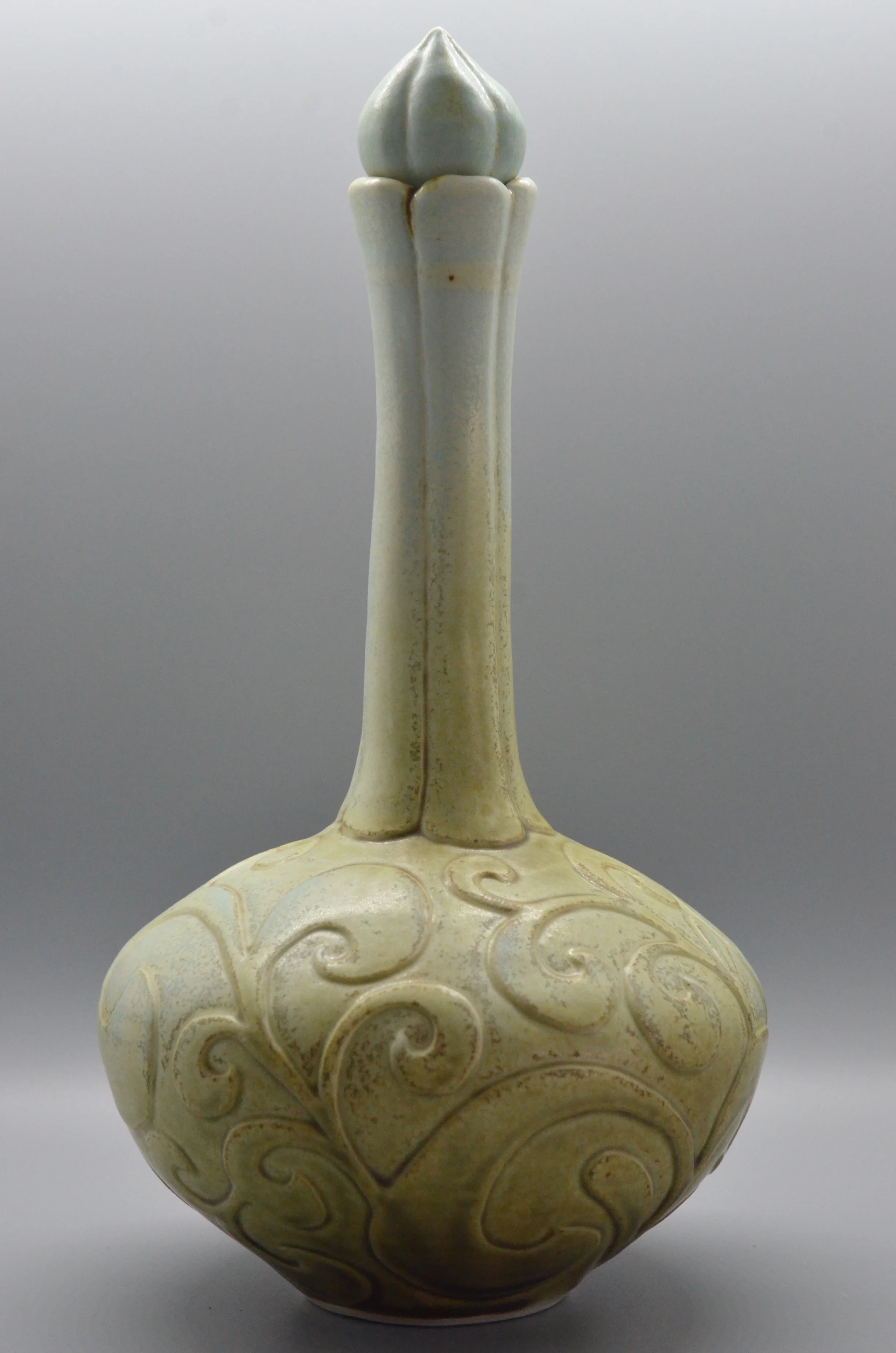 Tall Bottle with Carved Curls and Topper