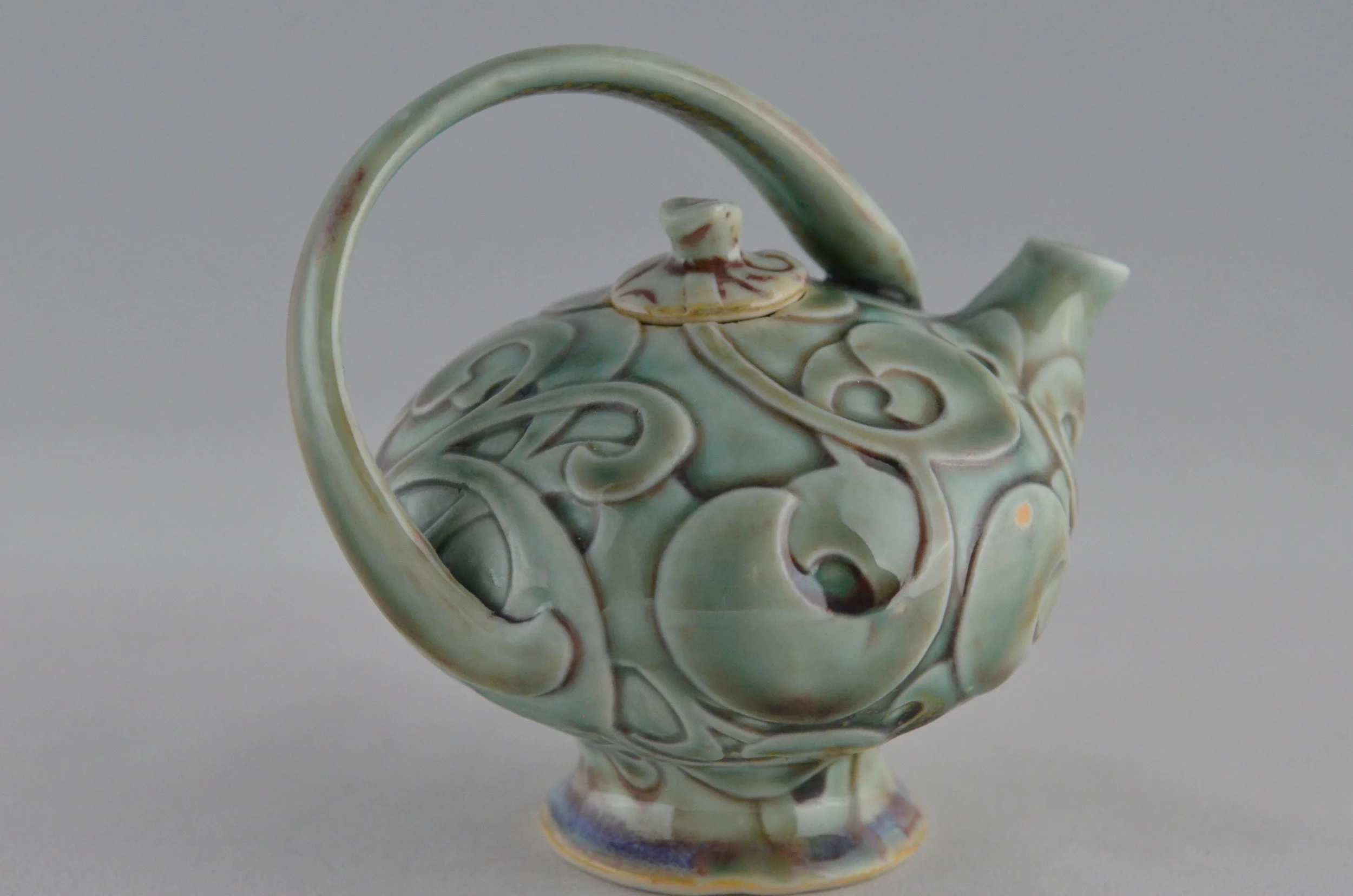 Small Teapot With Two Layers of Carved Curls