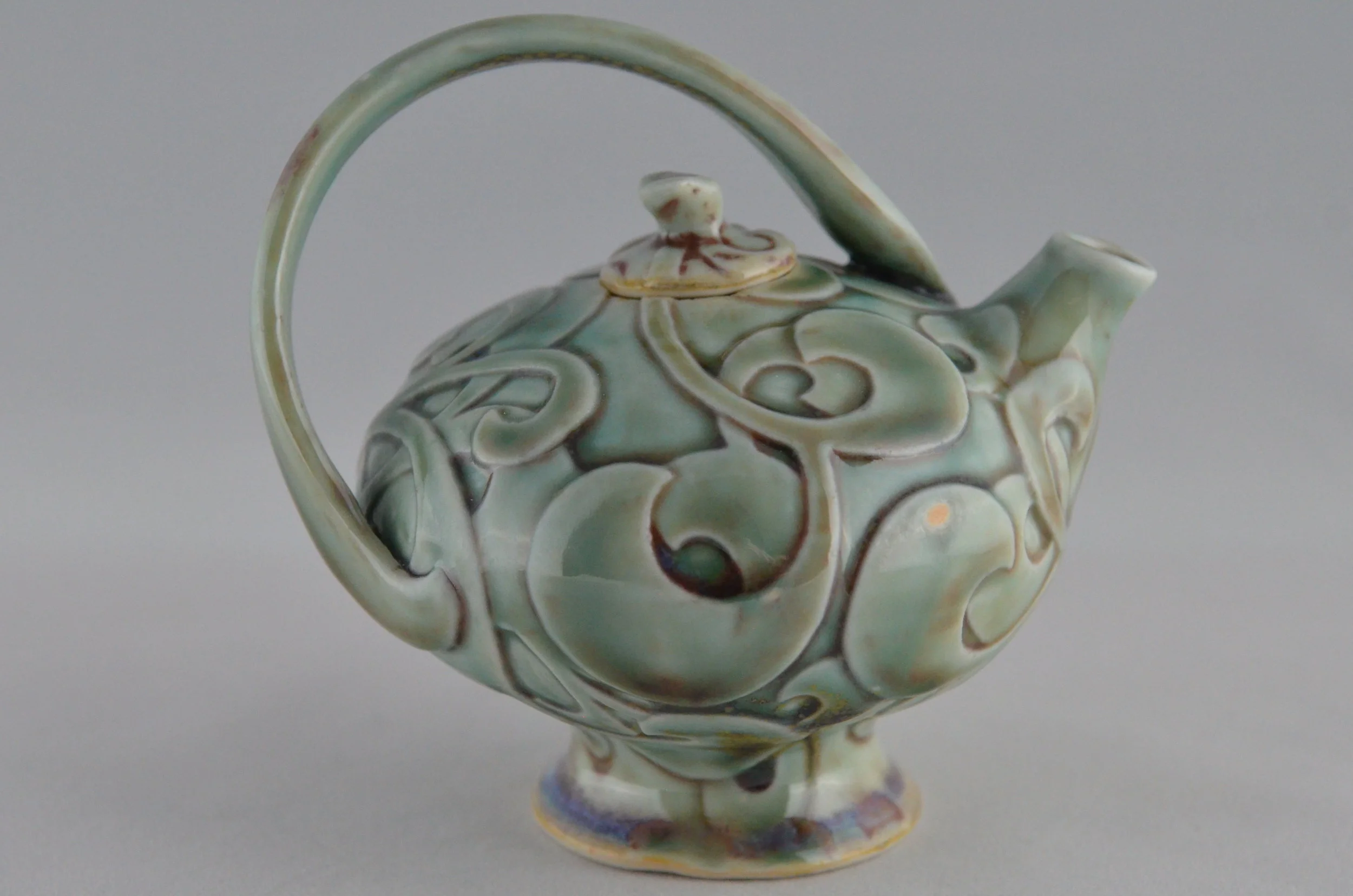 small teapot with carved curls 2 right.JPG