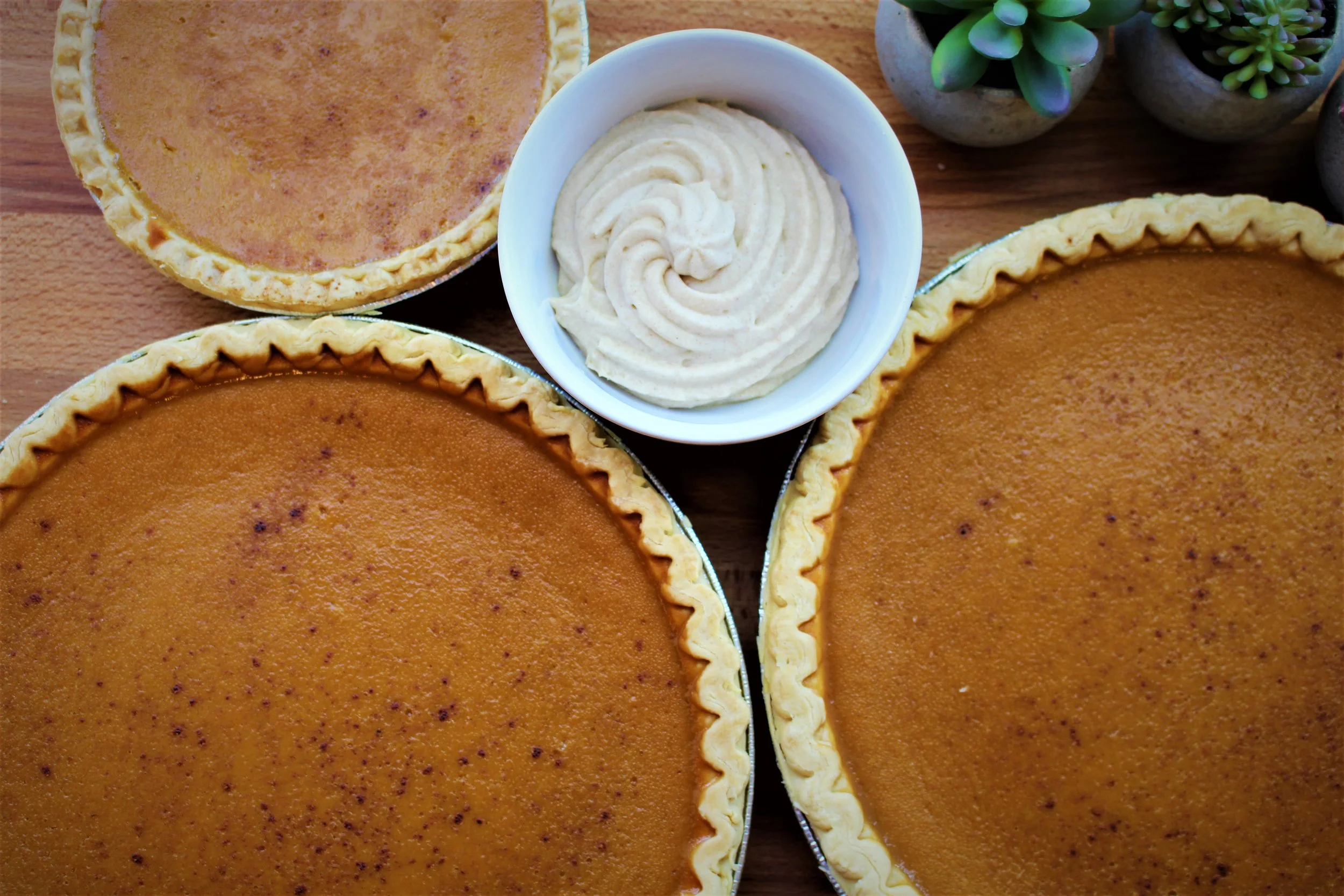 fresh pumpkin pie with brown sugar whipped topping