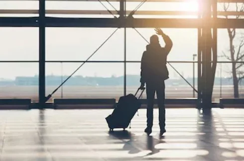saying-goodbye-airport-silhouette-traveler-260nw-585257981.jpg