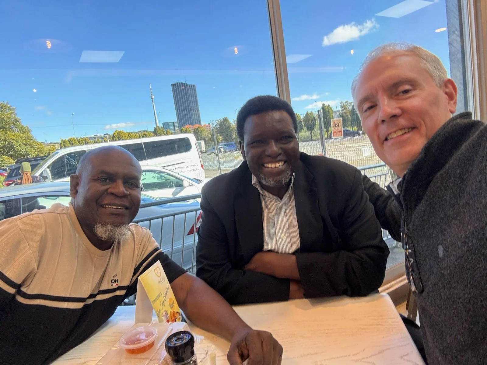 Sam Ndou, John Chinyowa, and Joe
