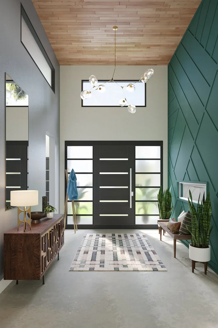 mid-century modern industrial foyer with double-height ceiling, wood ceiling, green accent wall, modern chandelier, and entry bench, designed by Joshua Jones