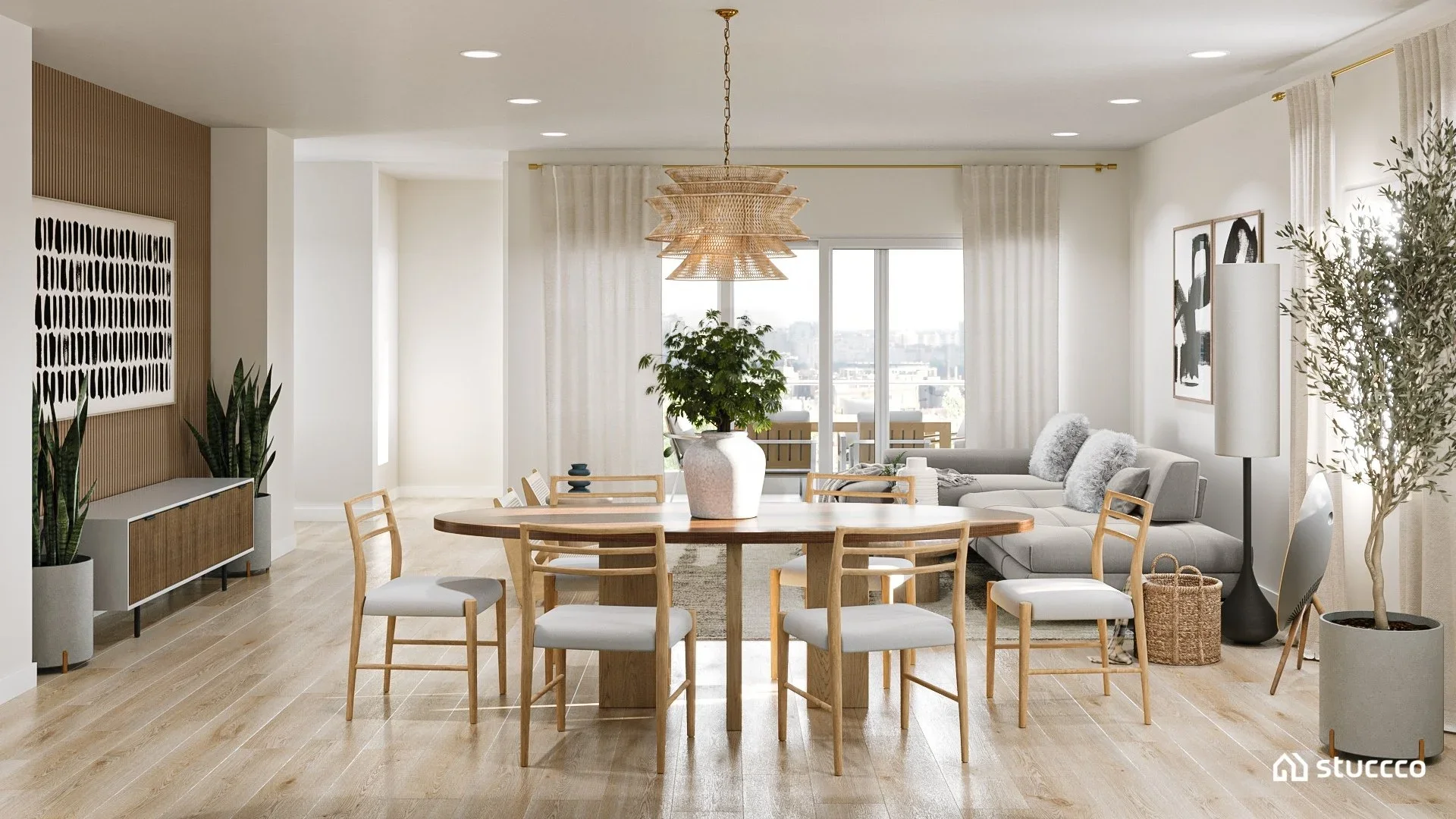 Japandi open concept dining and living room with wood dining table, neutral seating, woven pendant light, light wood flooring, and soft minimalist decor.