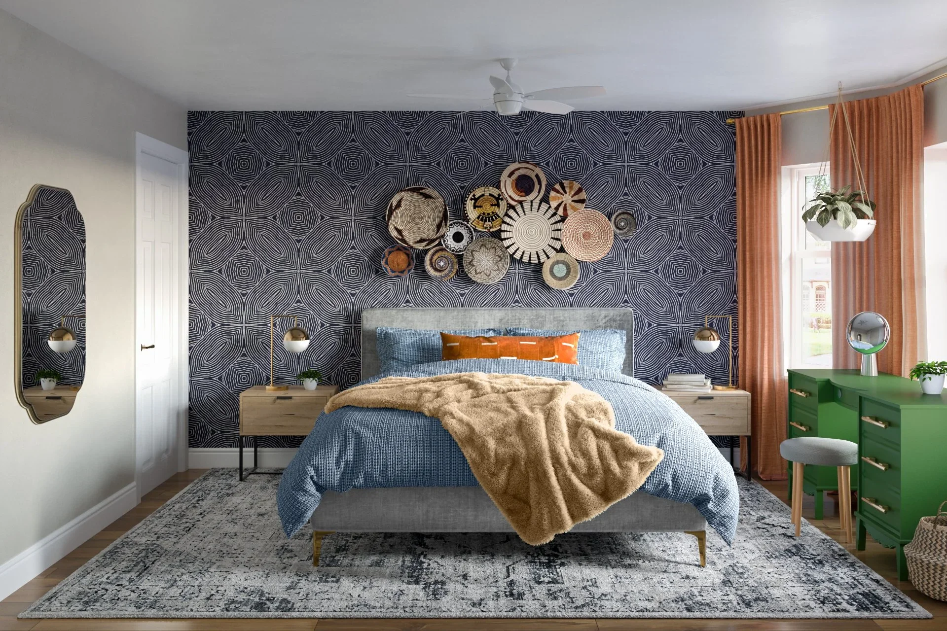 Boho Chic style primary bedroom with a blue upholstered bed, navy geometric accent wall, woven basket wall decor, wood nightstands, green dresser, orange curtains, and a throw blanket layered across the bedding.